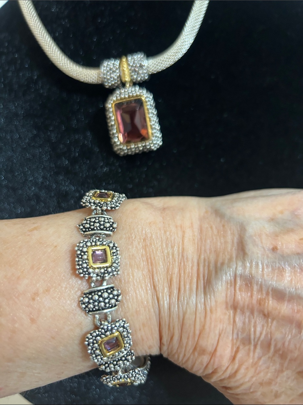 Sterling Silver & Gold Accent Bracelet which purple stone